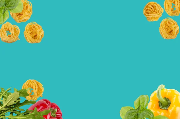 Top view of raw ingredients of taliatele pasta on creative cyan blue background — Stock Photo, Image