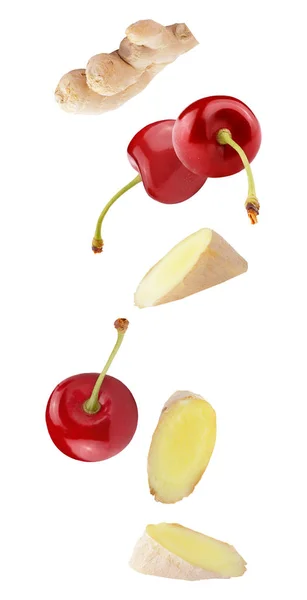 Αιωρούμενα φρούτα κερασιάς και τζίντζερ απομονωμένα σε λευκό φόντο — Φωτογραφία Αρχείου