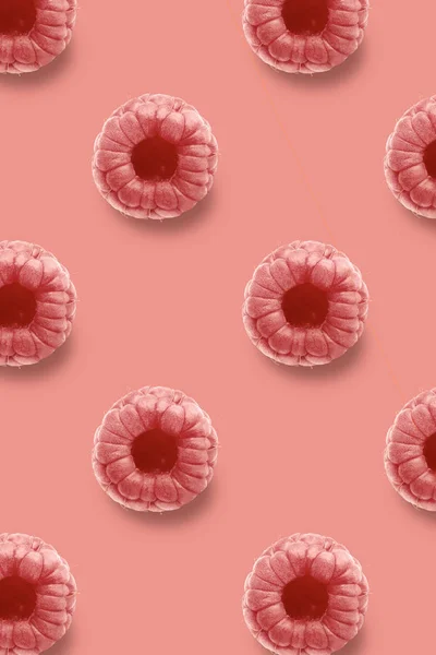 Whole raspberry fruits pattern on colorful background