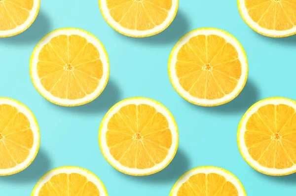 Vivid fruit pattern of fresh lemon on colourful background