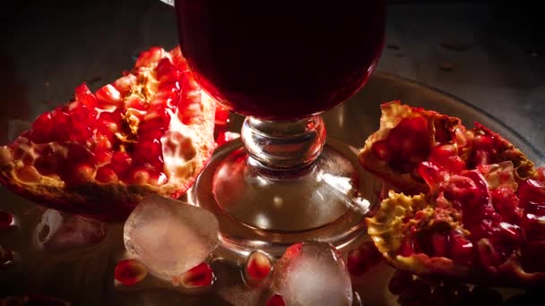 Pomegranate and Pomegranate Juice with Ice — Stock Video