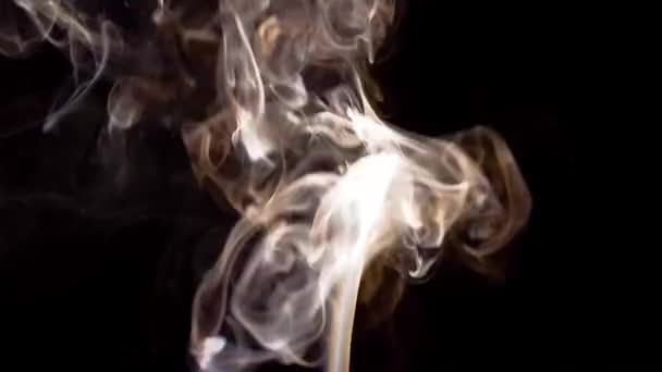 Smoke illuminated by a ray of light — Stock Video