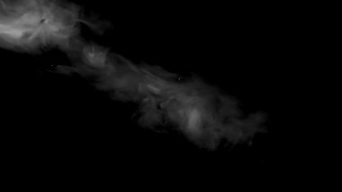 Bir ışık ışını tarafından aydınlatılmış duman