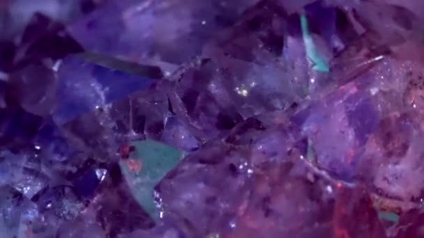 Rotating amethyst crystals. Revolving Abstract Background Closeup — Stock Video
