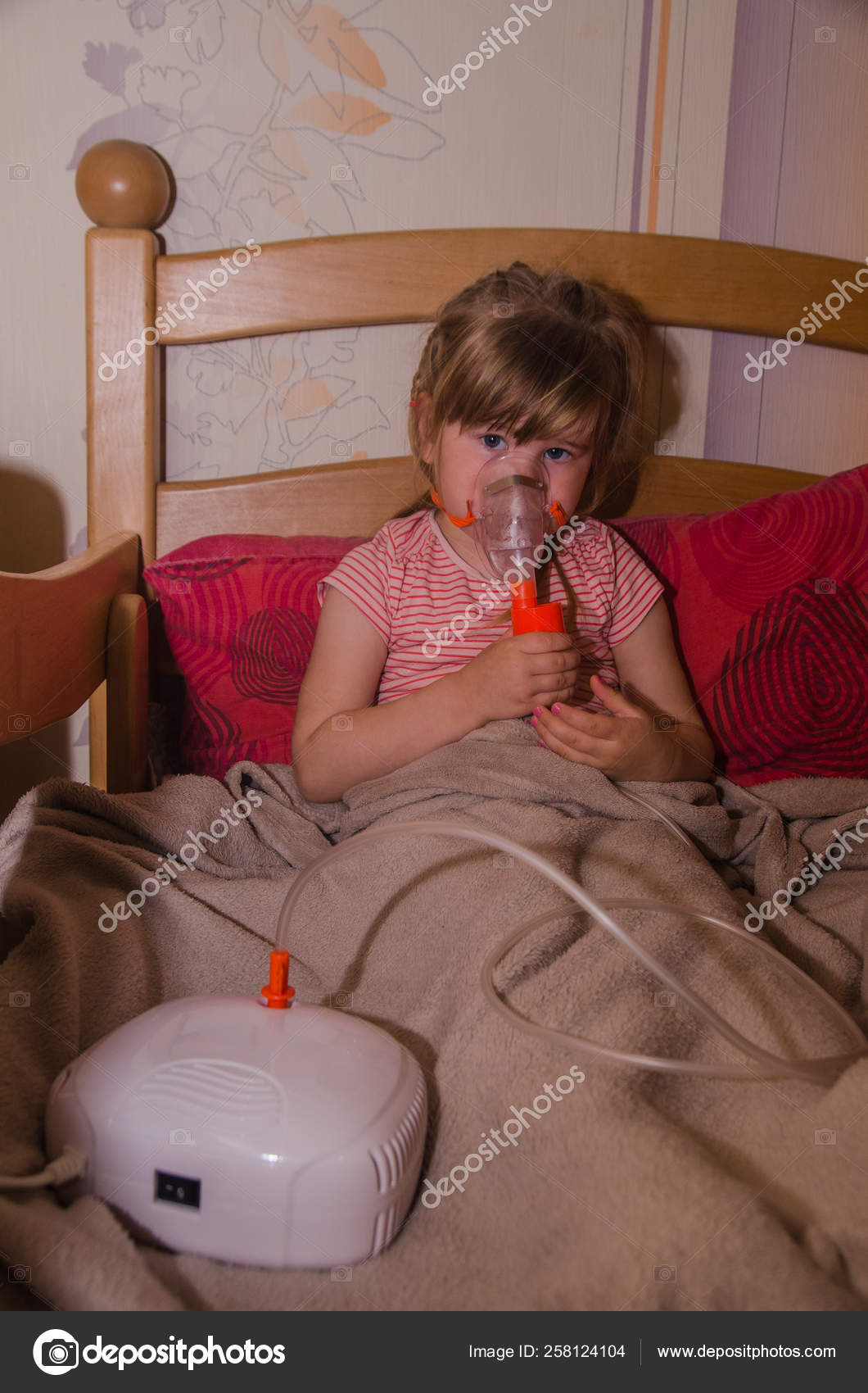 Little Girl Making Inhalation With Nebulizer At Home Child