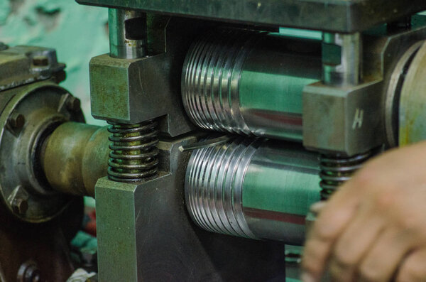 jewelry metal rolling on shafts. Close UP
