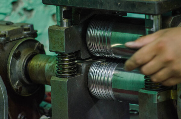 jewelry metal rolling on shafts. Close UP