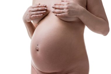 Beyaz arka plan üzerinde gebelik kavramı izole sanat nude, seksi çıplak hamile kadın