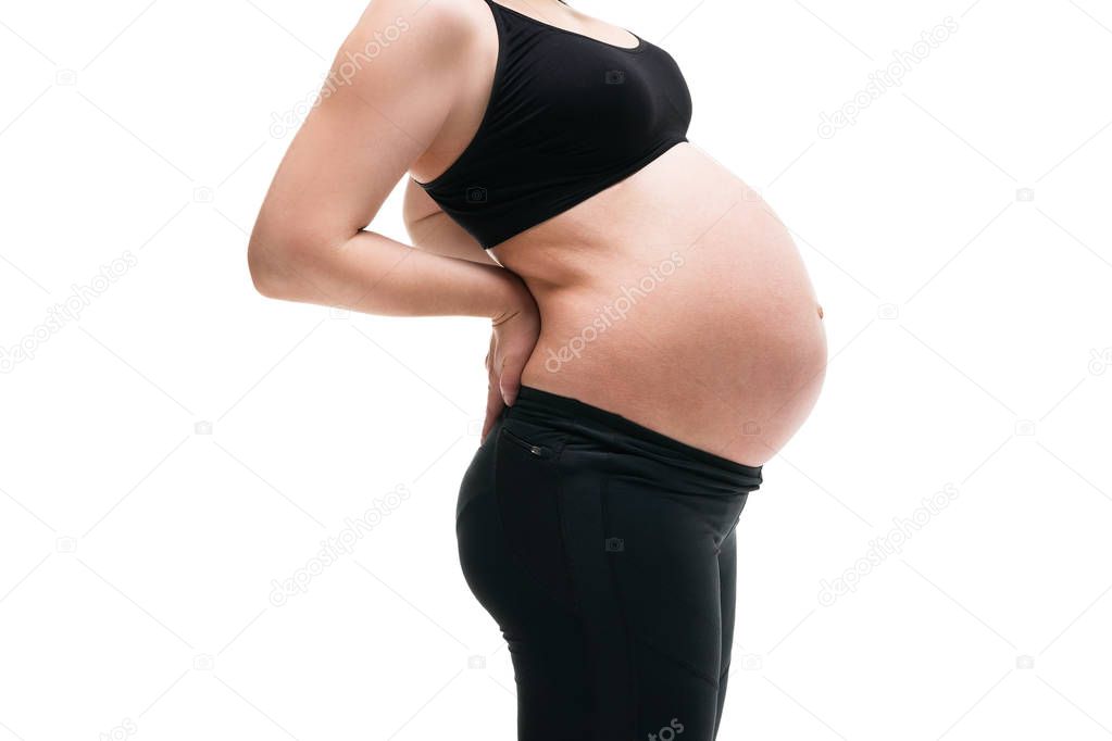 Pregnant woman with back pain, risk of premature birth, isolated on white background