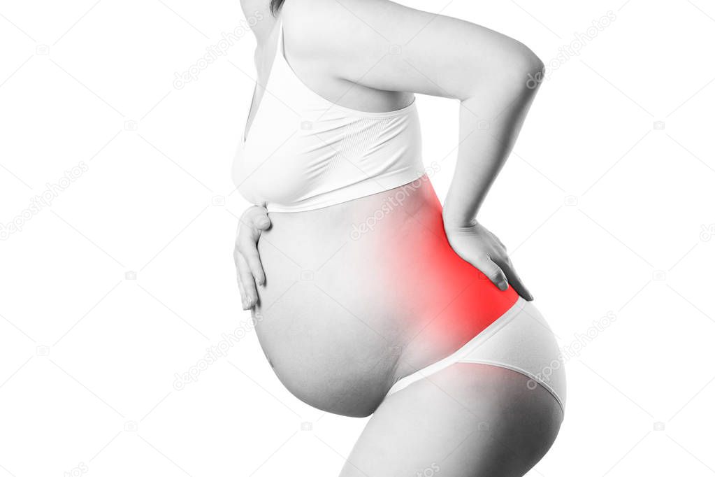 Pregnant woman with back pain, risk of premature birth, isolated on white background