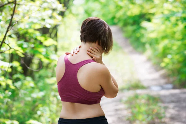 Woman Back Pain Neck Injury Trauma Workout Outdoors Concept — Stock Photo, Image