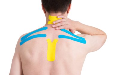 Kinesiology taping on human back, isolated on white background clipart