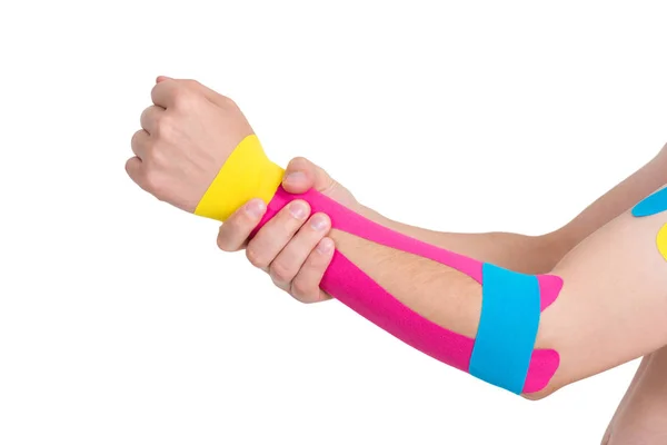 Kinesiology Taping Ludzką Ręką Izolowana Białym Tle — Zdjęcie stockowe