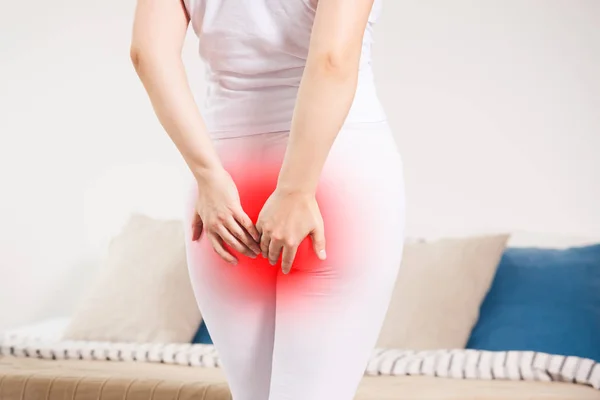 Woman Suffering Hemorrhoids Home Anal Pain Painful Area Highlighted Red — Stock Photo, Image