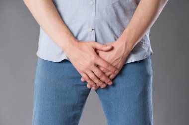 Prostat, adam prostatit veya gri arka plan üzerinde atış studio bir zührevi hastalık acı acı