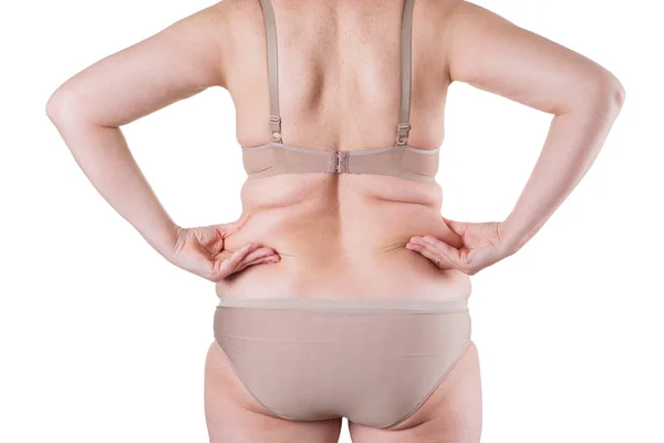 Tlustá žena zpátky ve spodním prádle na bílém pozadí — Stock fotografie