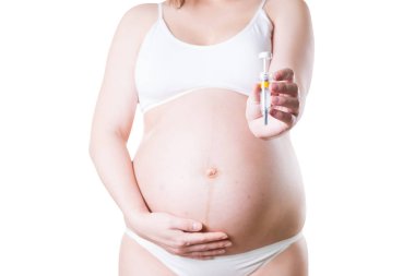 Pregnant woman injects anticoagulants into her stomach clipart