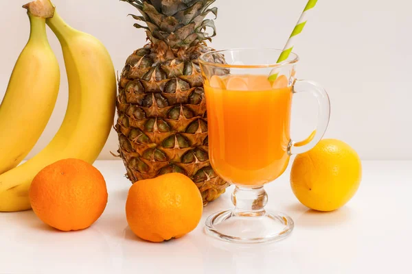 Glass Fruit Juice Straw Fresh Pineapple Bananas Mandarins White Background — Stock Photo, Image