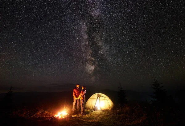 Romantic Couple Tourists Boy Girl Standing Illuminated Tent Burning Bonfire — Stock Photo, Image