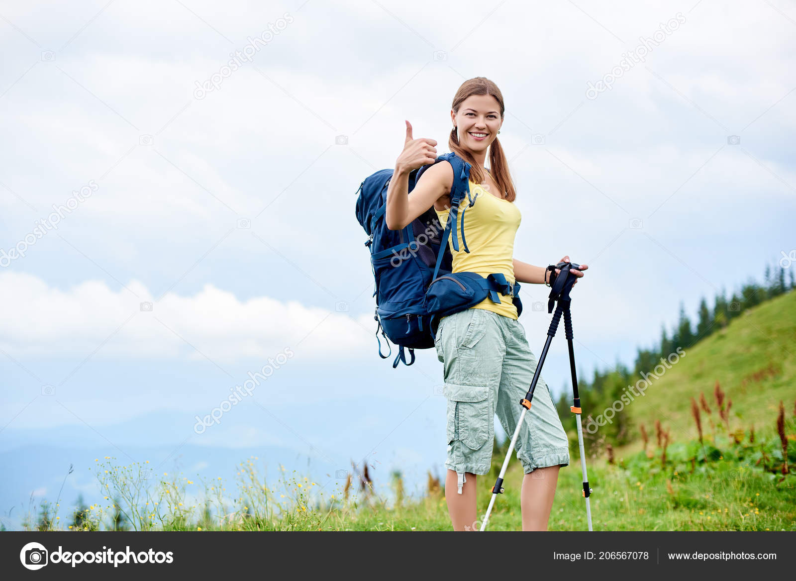 Attractive Happy Woman Backpacker Hiking Mountain Trail Walking Grassy Hill  Stock Photo by ©anatoliy_gleb 206567078