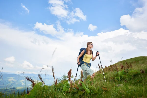 Attractive Happy Woman Backpacker Hiking Mountain Trail Walking Grassy Hill  Stock Photo by ©anatoliy_gleb 206567078