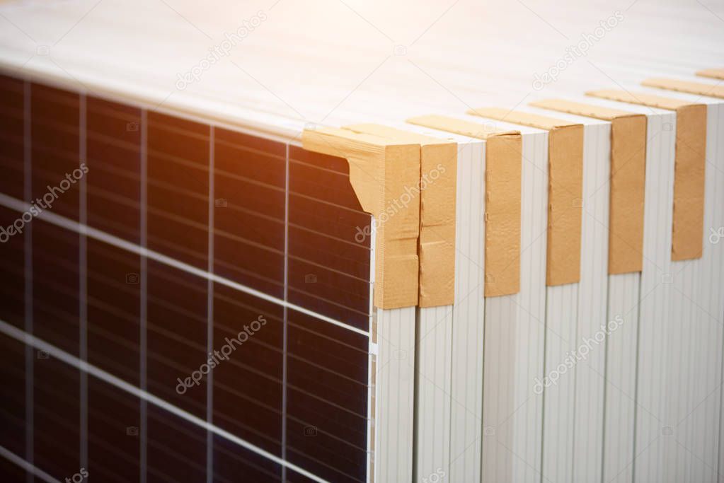 Close-up of new solar photo voltaic modules set ready for buying, transportation and installation. Renewable eco-friendly green energy production and panel system installation concept.