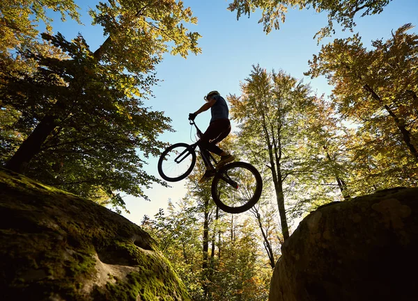 Young Male Biker Jumping Trial Bicycle Two Big Boulders — Stock Photo, Image
