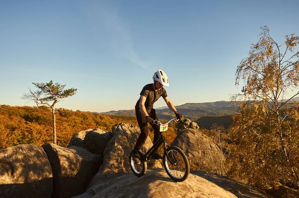 Young Male Cyclist Balancing Trial Bicycle Top Big Boulder — Stock Photo, Image