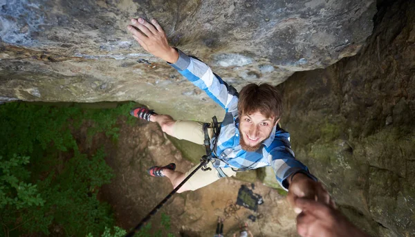 Man Hanging Rope Rock Stretching Out Hand Asking Help — Stock Photo, Image