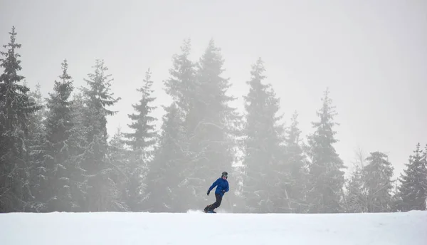 Young Female Snowboarder Sliding Flat Snow Covered Road — ストック写真