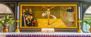 Wittenberg, Germany - March 18, 2018 Martin Luther Chriist Altarpiece Saint Mary's City Church Stadtkirche Lutherstadt Wittenberg Germany. Martin Luther's church. Founded in 1187. Cranach Elder Installed altarpiece 1547. clipart