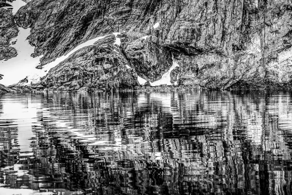 Orange Rock Cliff White Snow Reflection Abstract Closeup Paradise Bay — Stock Photo, Image