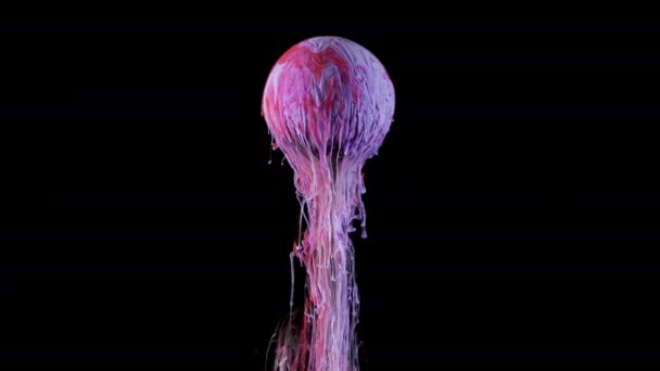 Vícebarevné inkoustové barvy pomalu proudí z kuličky — Stock video