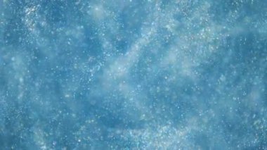 Sığ alan derinliği sualtı ile zarif, ayrıntılı ve keyifli bokeh ve parçacıklar görseller