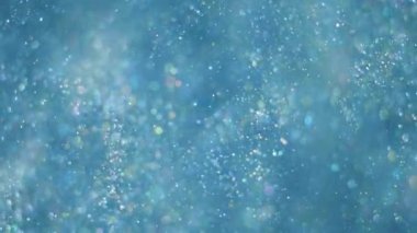 Sığ alan derinliği sualtı ile zarif, ayrıntılı ve keyifli bokeh ve parçacıklar görseller