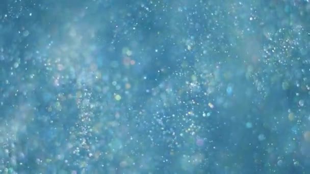 Elegant, detaljerad och förtjusande bokeh och partiklar visuella med grunt skärpedjup under vattnet — Stockvideo