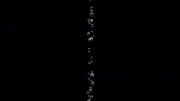 Transparent bubbles go up underwater over black background — Stock Video