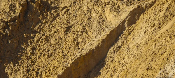 Die Textur Des Sandes Aus Der Sandkarriere Mit Unterschiedlichen Spuren — Stockfoto