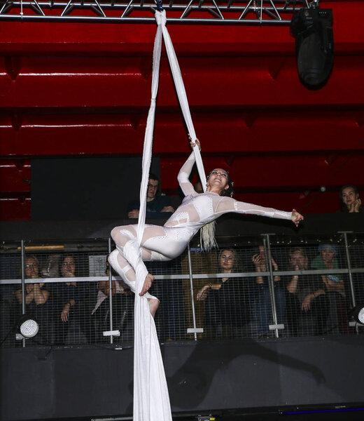 YOSHKAR-OLA, RUSSIA, DECEMBER 08, 2018: Dance and acrobatic show - love is 2018, from CrazyPole dance and aerial acrobatics Studio.