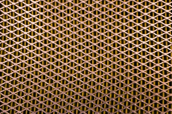 Steel mesh. Grid of car air filter. Metal grill texture of vehicle air filter