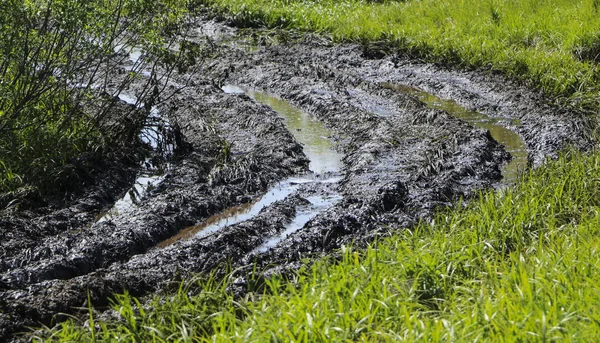 Schmutzige Landstraße Nasser Schmutz Unbefahrbarkeit Schlamm Und Pfützen Auf Dem — Stockfoto