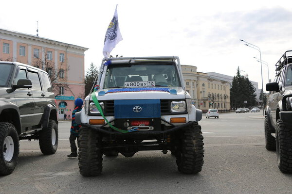 YOSHKAR-OLA, RUSSIA - MAY 5, 2018: Exhibition of jeeps of off-road vehicles modified and equipped with winches in  central square of  city.