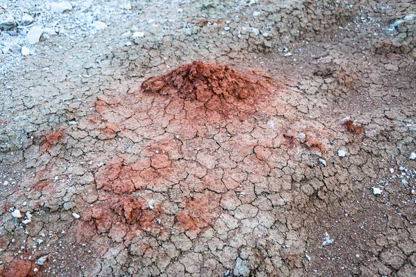 textures of various clay layers underground in  clay quarry after  geological study of the soil. colored layers of clay and stone in  section of the earth, different rock formations and soil layers.