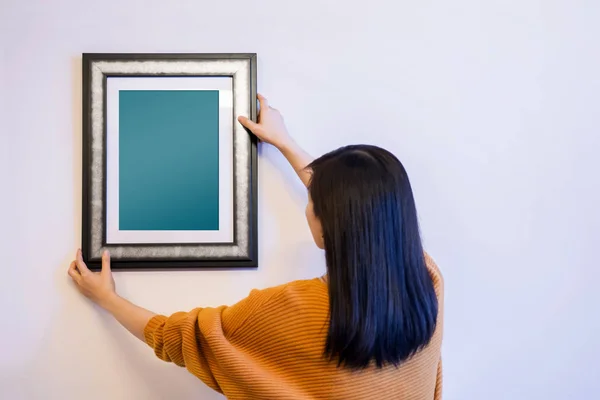 Photo Frame Mockup Clipping Path Woman Decorating New House Hanging — Stock Photo, Image