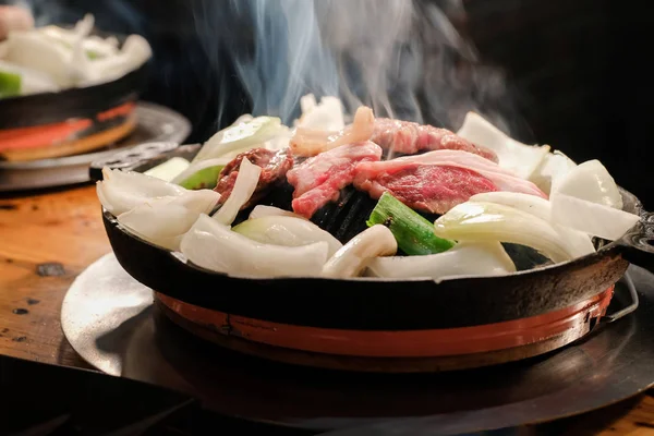 Jingisukan or Genghis Khan, Japanese Grilled Mutton on a Convex Metal Skillet, The Particularly Popular Food on the northern island of Hokkaido