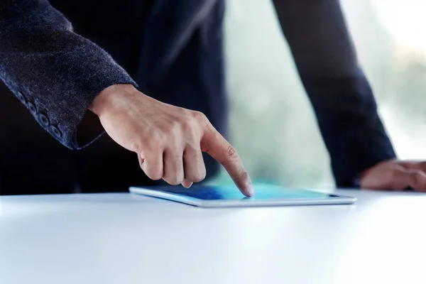 Businessman Working on Digital Tablet in Office at the Desk. Sel — Stock Photo, Image