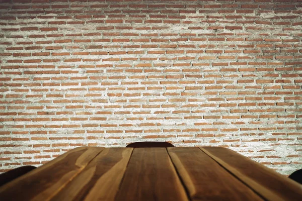 Brick Wall in Industrial loft Style at Cafe or Restaurant. Woode