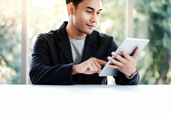 Happy Businessman Working on Digital Tablet in Office. Sitting a — Stock Photo, Image