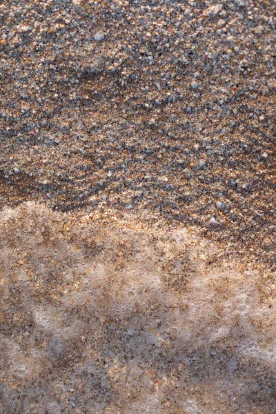 sand texture and wave of the sea with foam