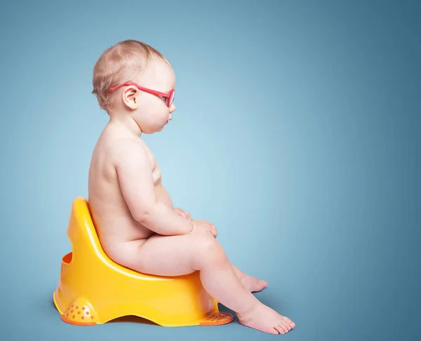 Little Baby Glasses Sitting Toilet Color Background — Stock Photo, Image